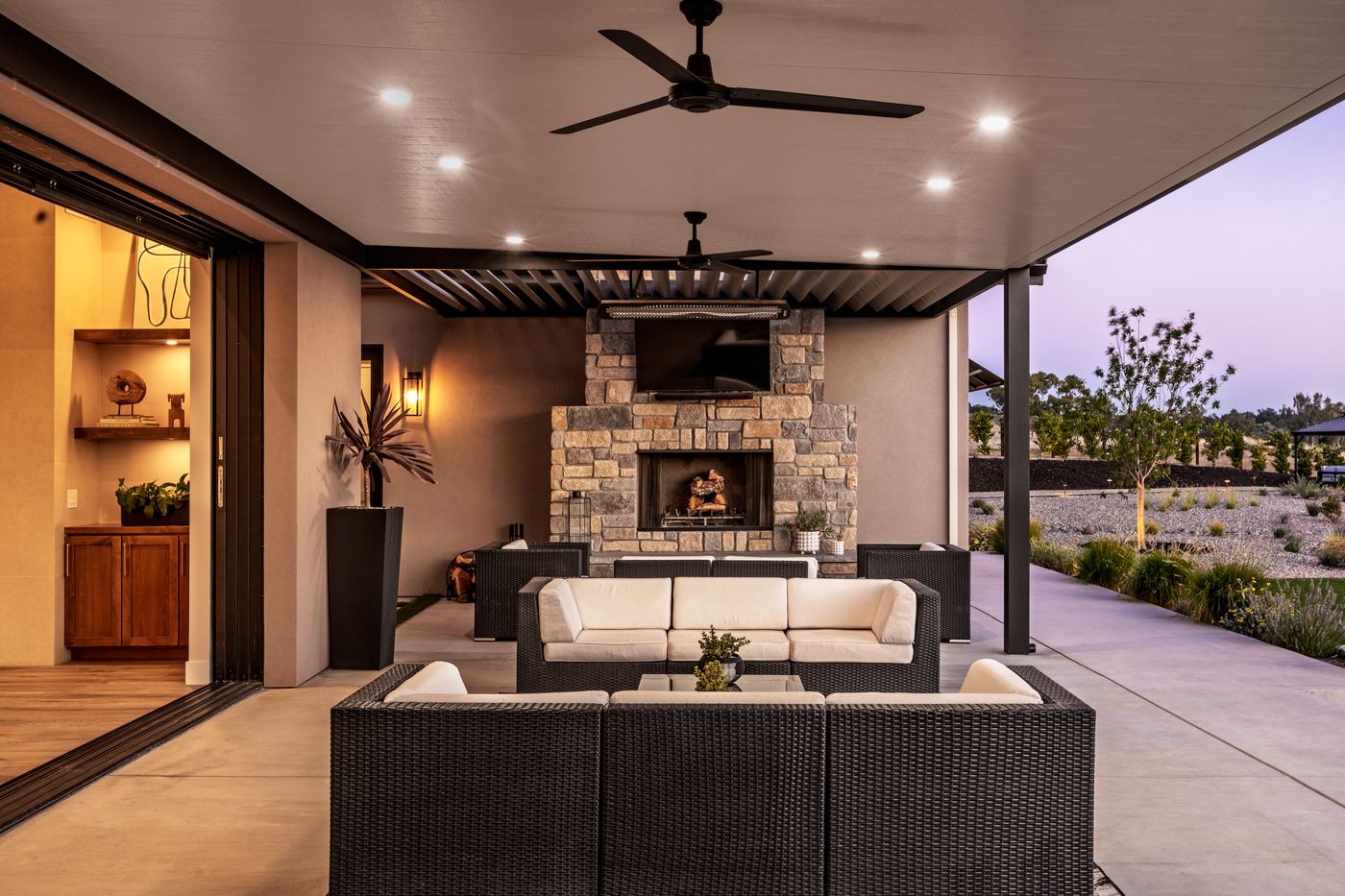 Covered outdoor room with stone fireplace, Modern Ranch, Templeton
